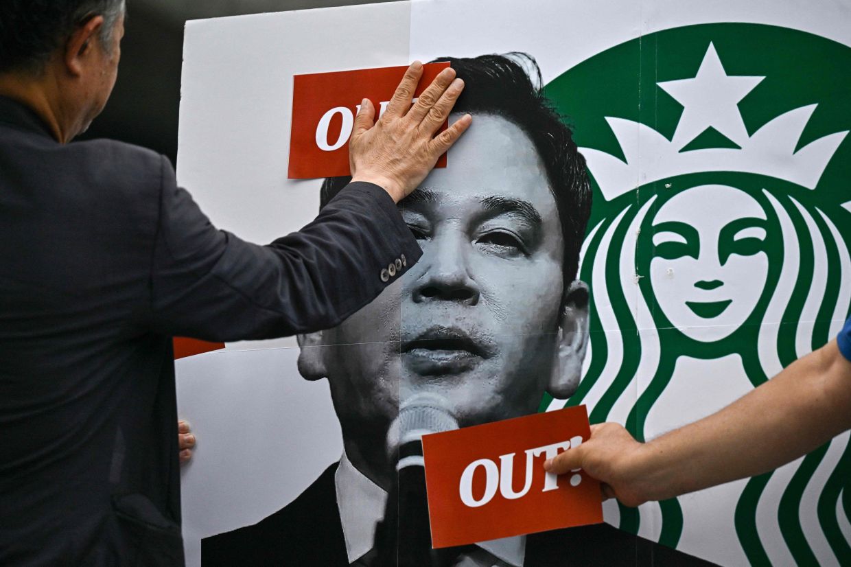 Starbucks Korea Executive Questioned Over 'Tank Day' Memorial Scandal