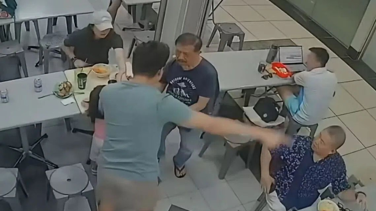 Singapore police investigate incident where elderly man pushed to ground after patting girl's head
