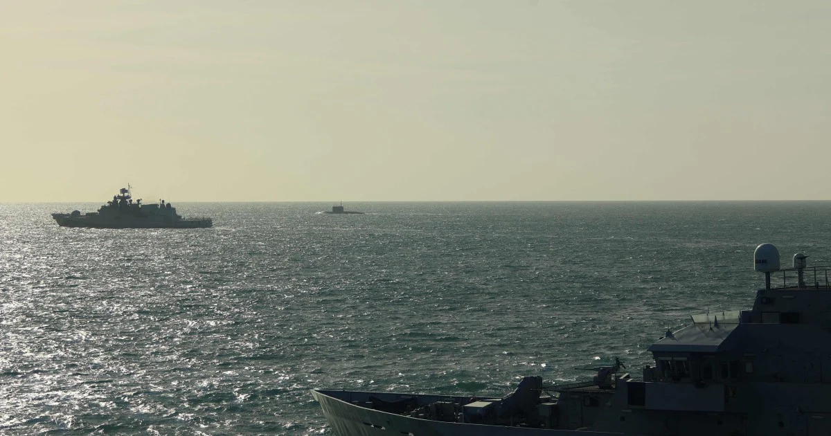 UK PM says Russian warship's warning shots 'reckless' not 'sinister'