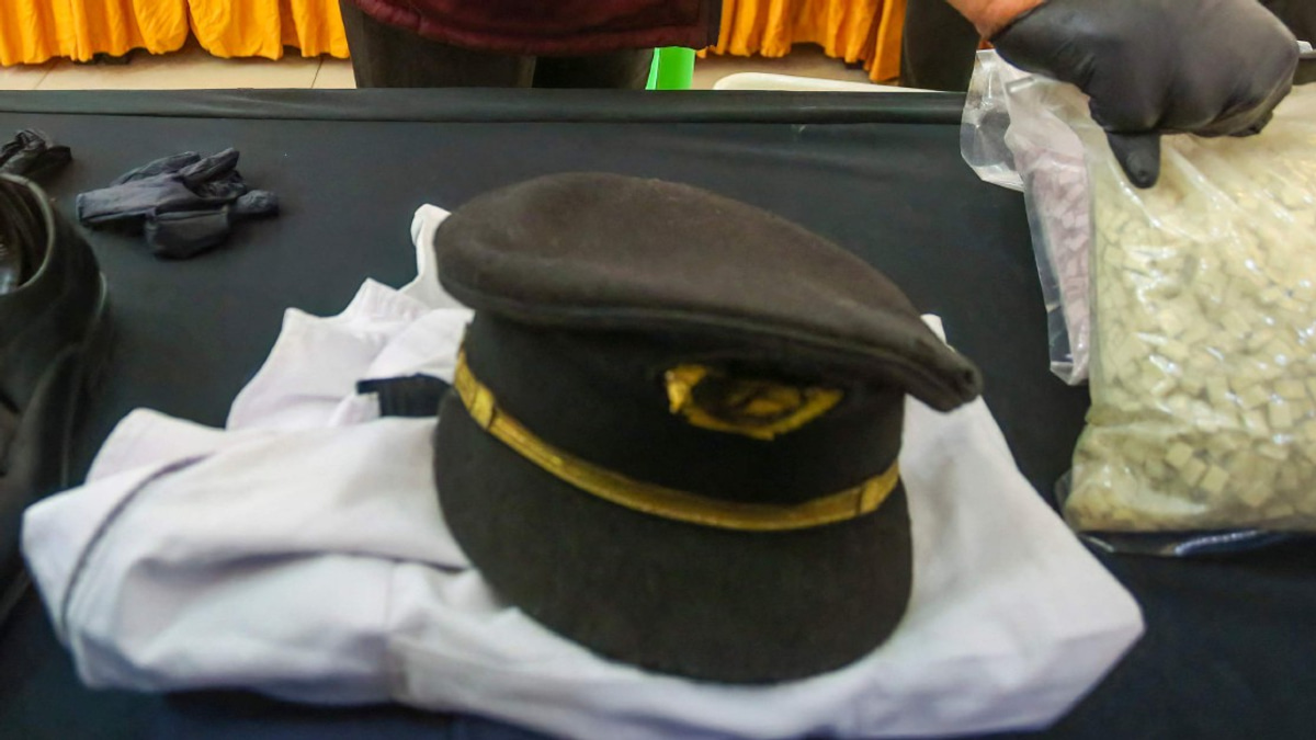 Airport worker questioned over Malaysia Airlines pilot drug smuggling inquiry