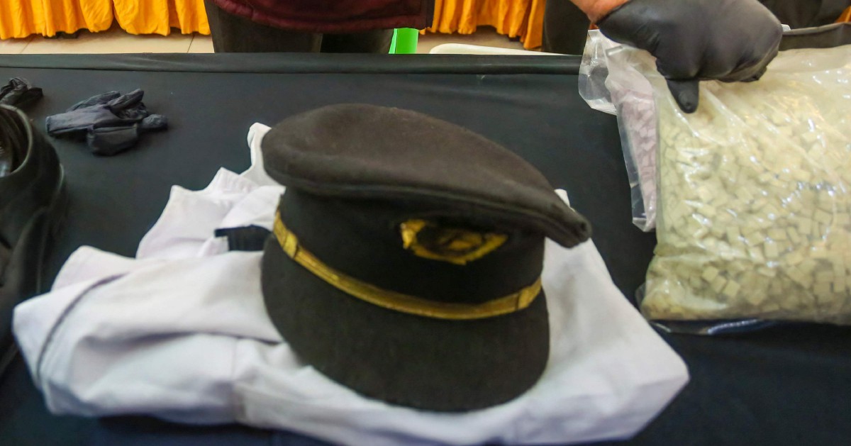 Airport worker questioned over Malaysia Airlines pilot drug smuggling inquiry