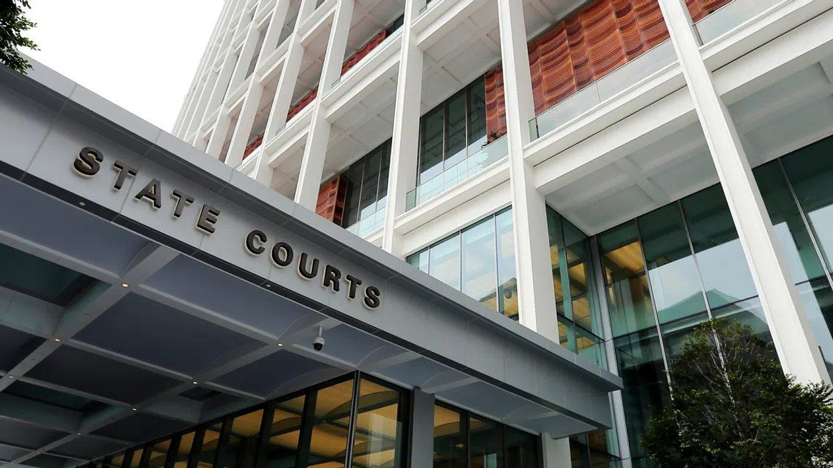 Singaporean woman charged in S$32 million luxury goods fraud linked to international scam ring