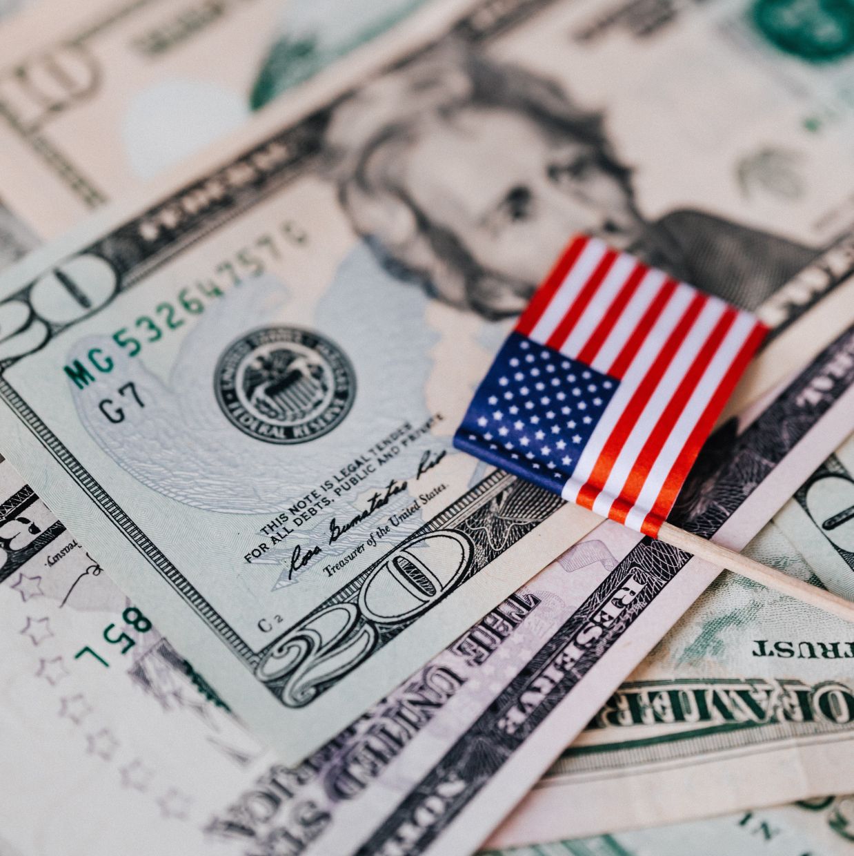 Dollar slumps on weak jobs data as Fed rate hike bets cool