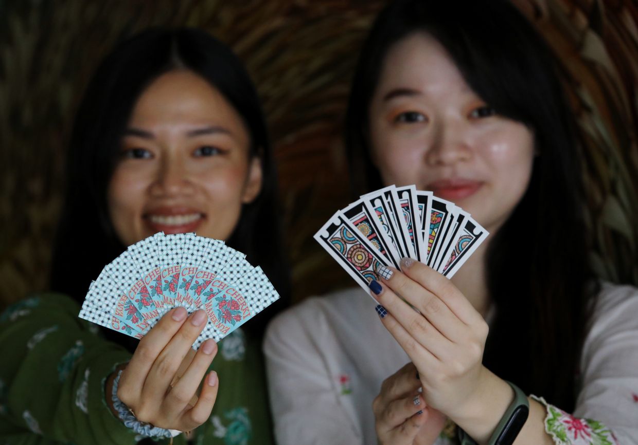 Sisters revive Peranakan card game Cherki with contemporary design to engage younger generations