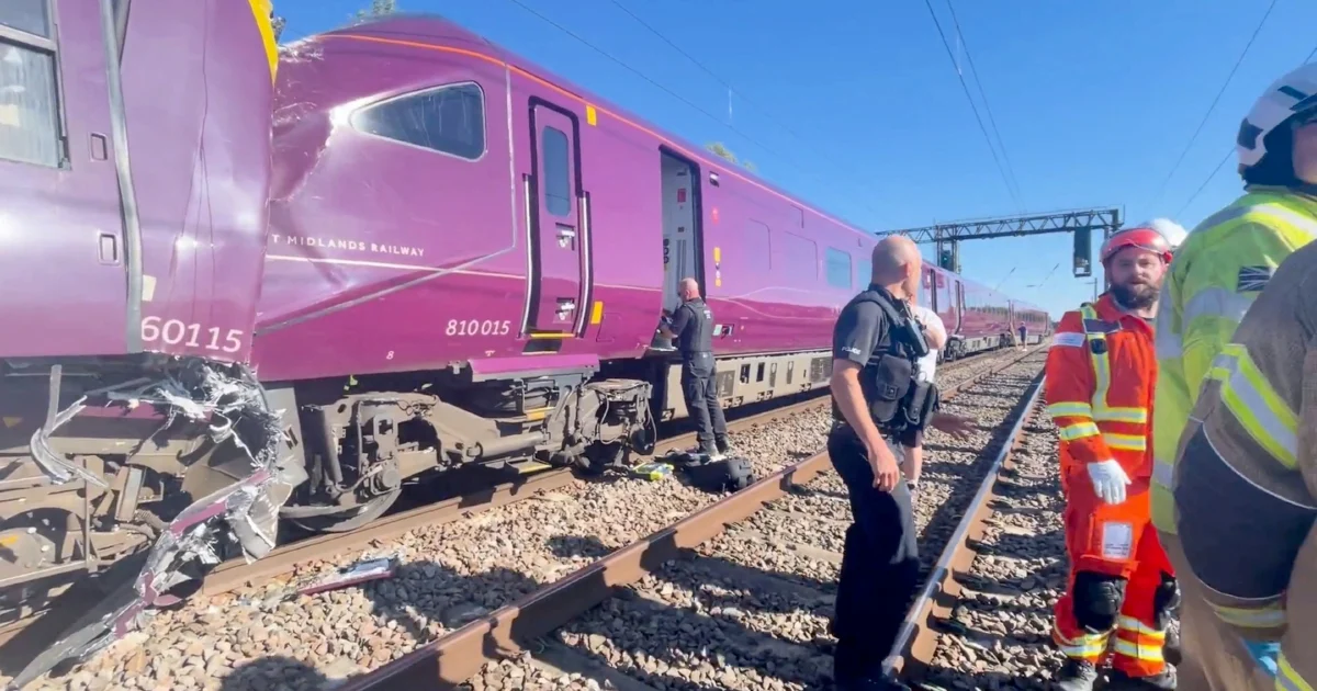 One killed, dozens injured as two passenger trains collide north of London