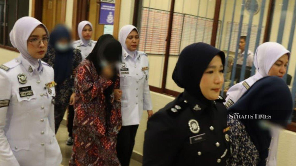 Three women, two minors, charged over viral motorcycle 'Superman' stunt in Kuantan