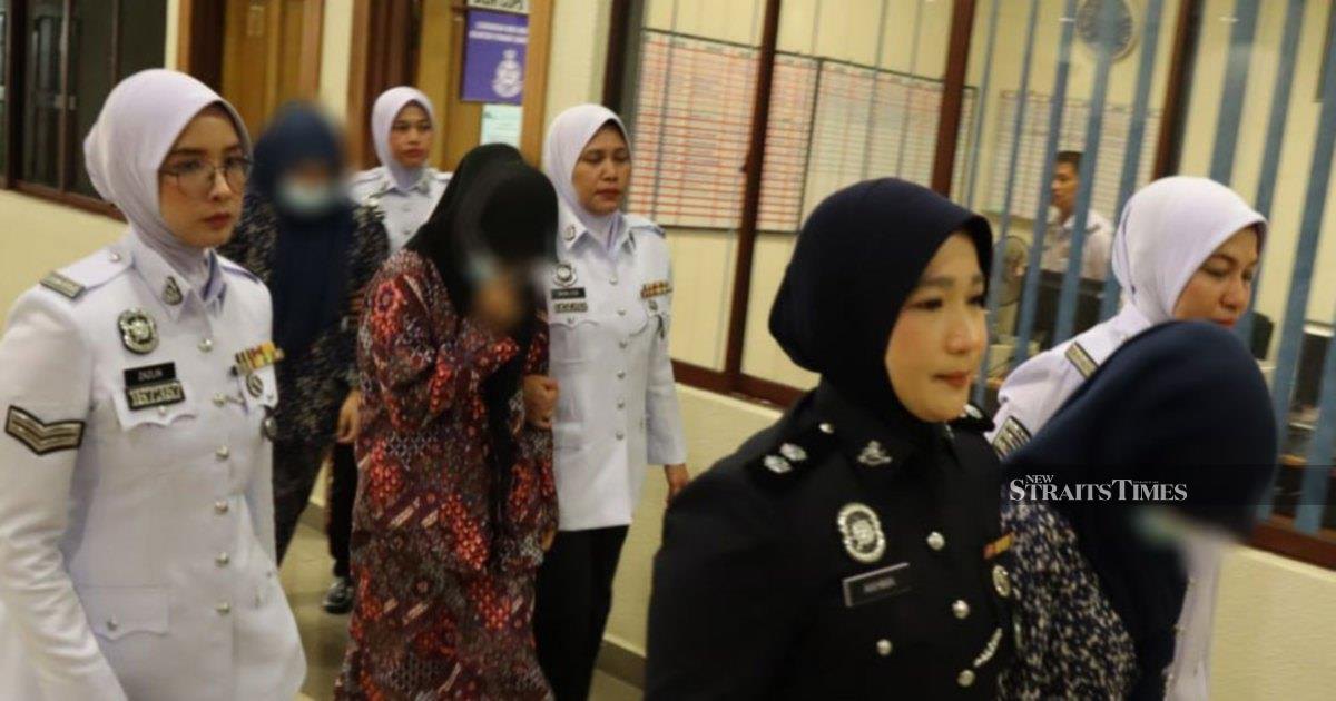 Three women, two minors, charged over viral motorcycle 'Superman' stunt in Kuantan