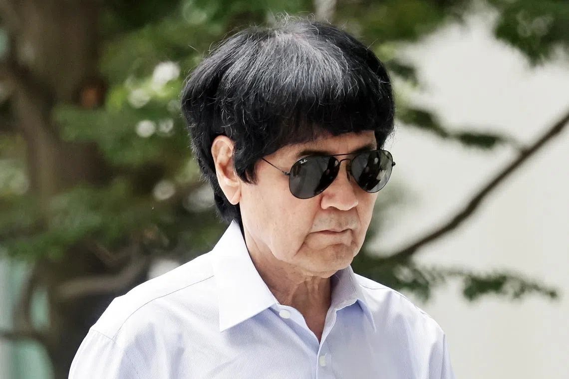 Singapore fines ex-air force chief S$5,000 for hitting woman with stroller
