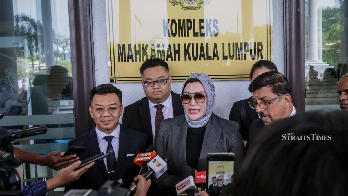 Seven years after charges filed, Zizie Izette acquitted in husband's corruption case